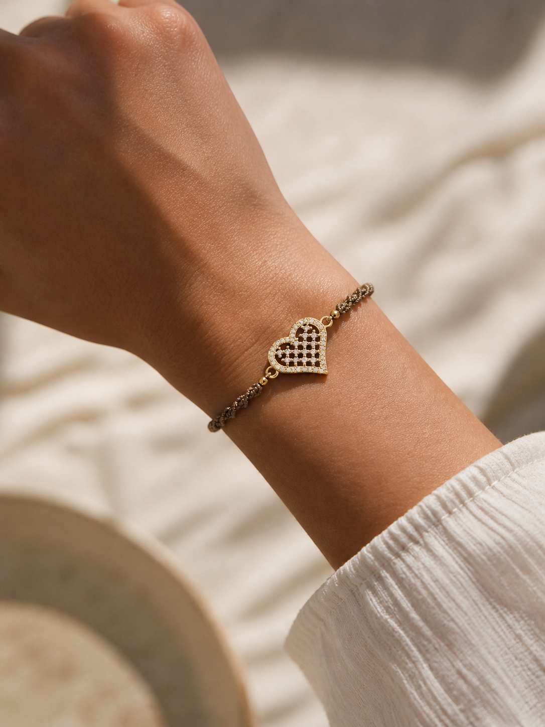 Geknüpftes Armband Herz Goldig