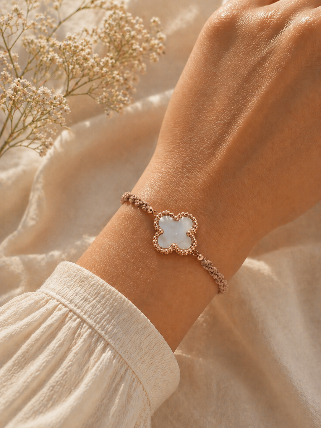 Geknüpftes Armband Perlmutt Kleeblatt Roségold
