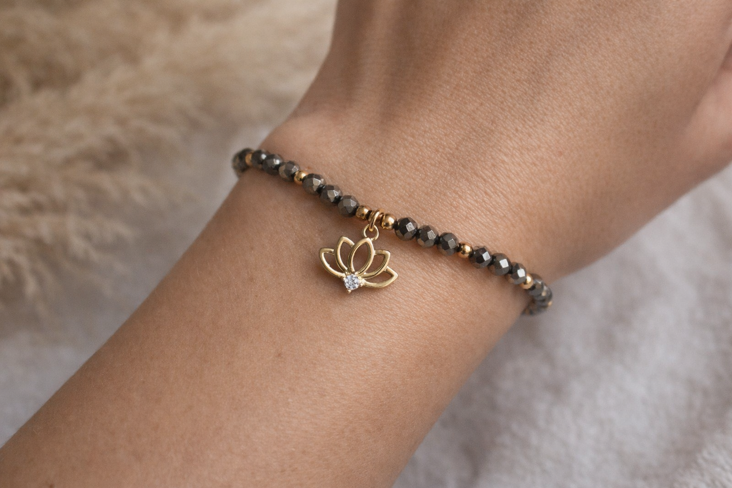 Armband Pyrit Lotusanhänger Gold